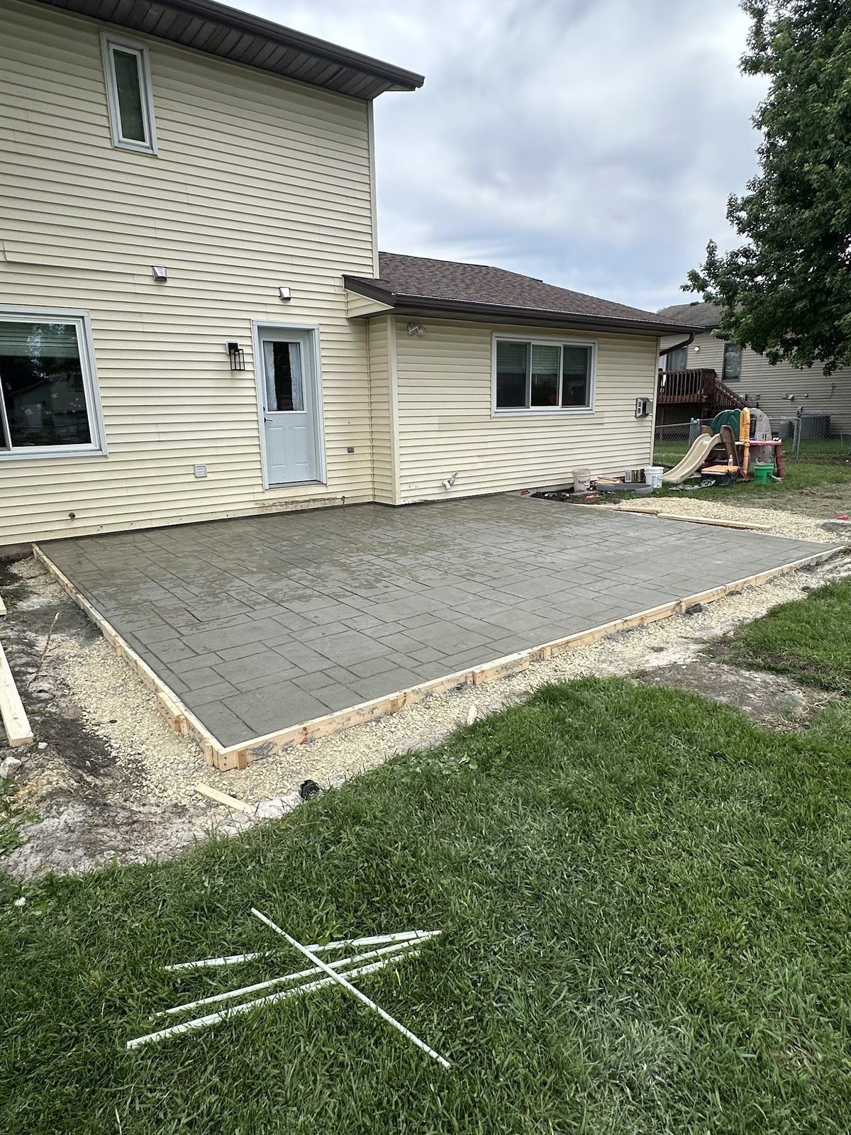 Stamped Patio After Placement — Completed patterned surface with a clean perimeter transition.